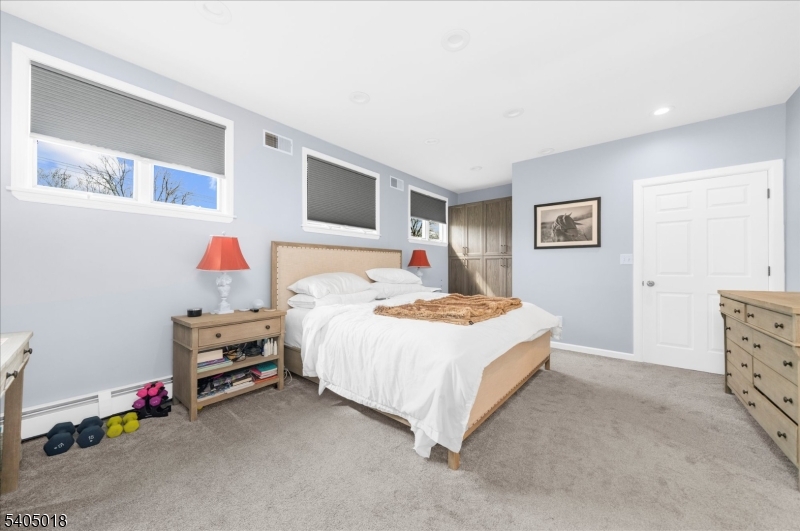 128 East Main Street Lebanon, NJ 08833 - Photo 21 of 36 a bedroom with a bed and a closet