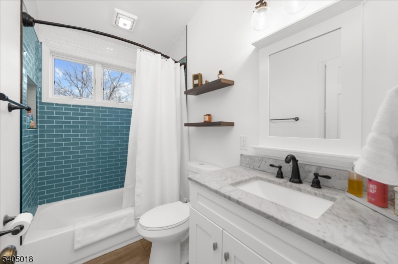 128 East Main Street Lebanon, NJ 08833 - Photo 22 of 36 a bathroom with a sink toilet and shower