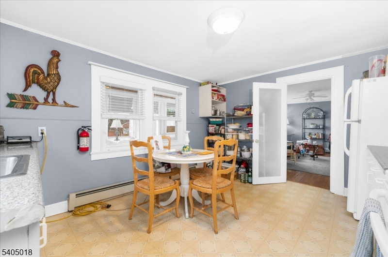 128 East Main Street Lebanon, NJ 08833 - Photo 23 of 36 a view of a dining room with furniture and a window