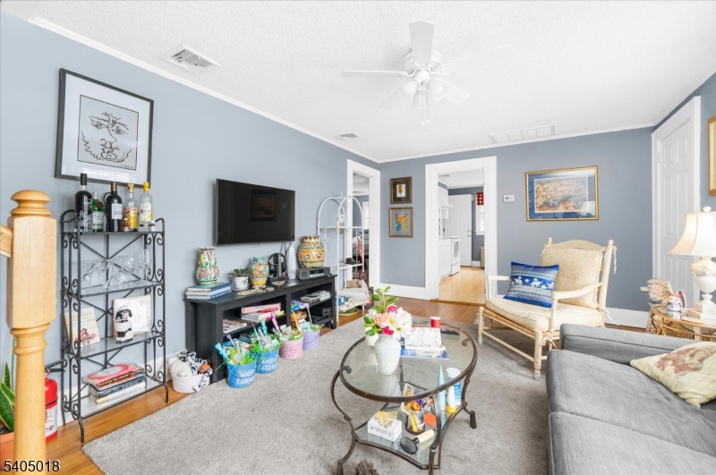 128 East Main Street Lebanon, NJ 08833 - Photo 25 of 36 a living room with furniture and a flat screen tv
