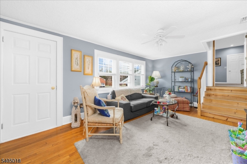 128 East Main Street Lebanon, NJ 08833 - Photo 27 of 36 a living room with furniture and a window