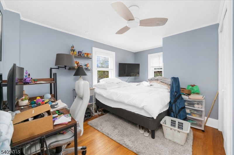 128 East Main Street Lebanon, NJ 08833 - Photo 31 of 36 a bedroom with a bed and a desk