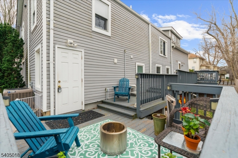 128 East Main Street Lebanon, NJ 08833 - Photo 34 of 36 a view of a patio with table and chairs potted plants