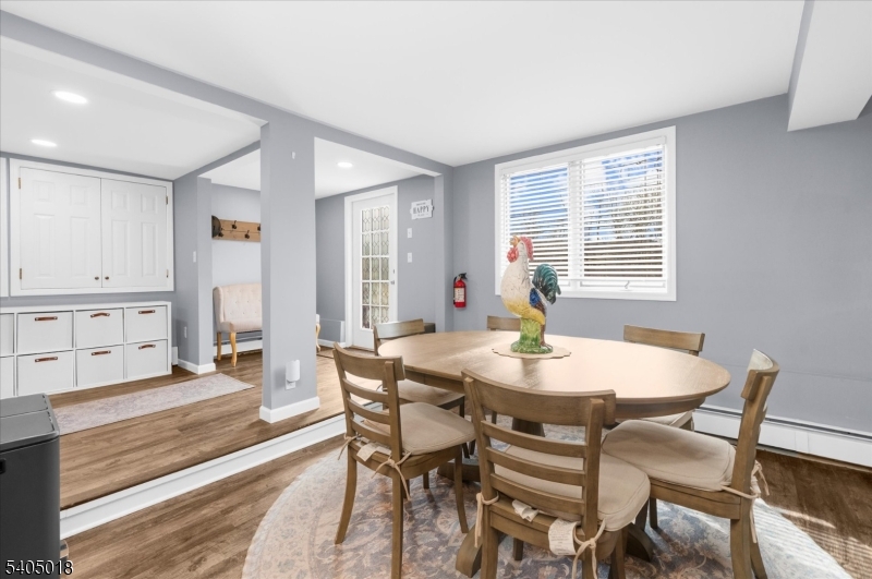 128 East Main Street Lebanon, NJ 08833 - Photo 5 of 36 a view of a dining room with furniture and wooden floor