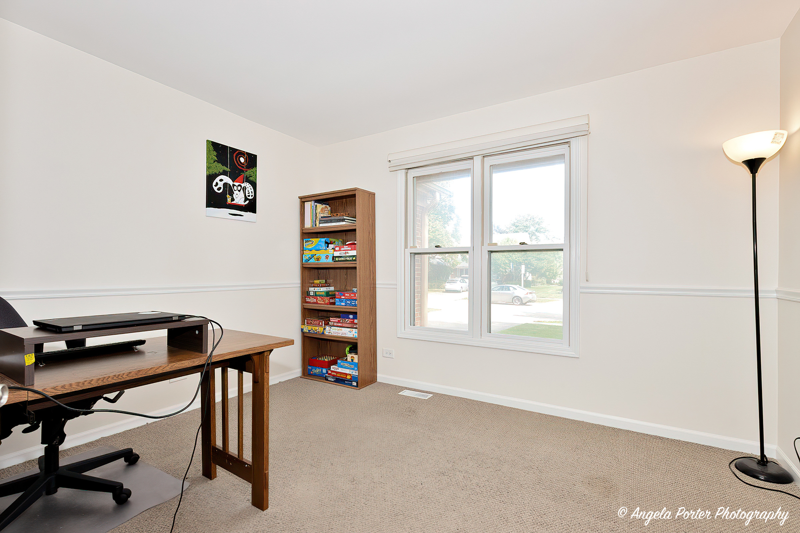 600 Raintree Road Buffalo Grove, IL 60089 - Photo 15 of 46 a view of a workspace with furniture and a window