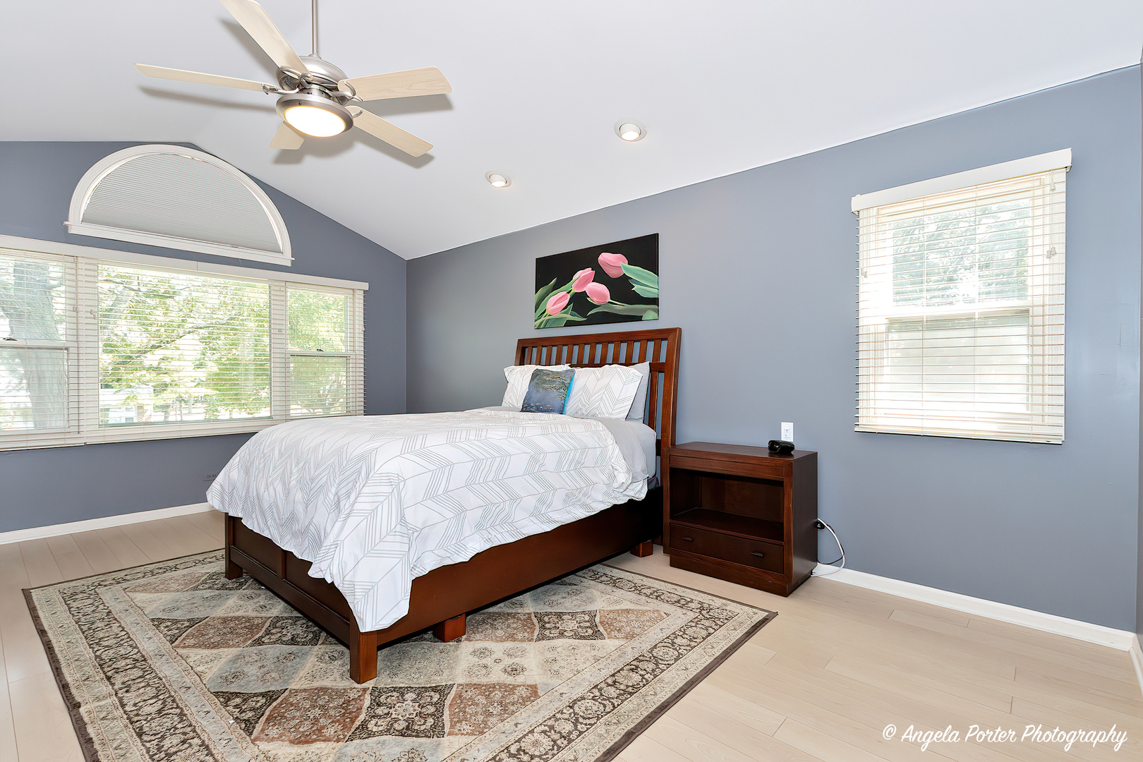 600 Raintree Road Buffalo Grove, IL 60089 - Photo 22 of 46 a bedroom with a large bed and a window