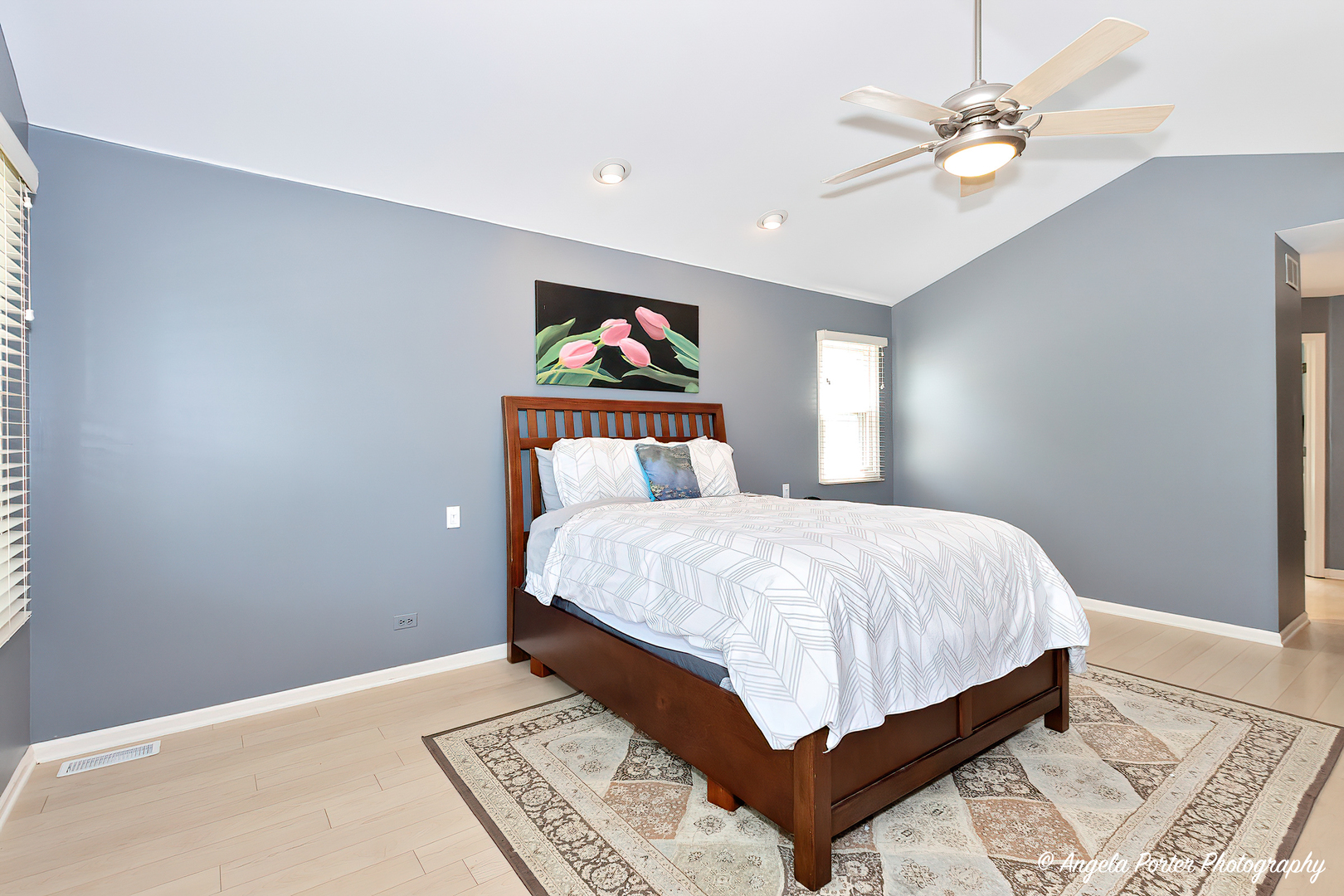 600 Raintree Road Buffalo Grove, IL 60089 - Photo 24 of 46 a bed sitting in a bedroom next to a window