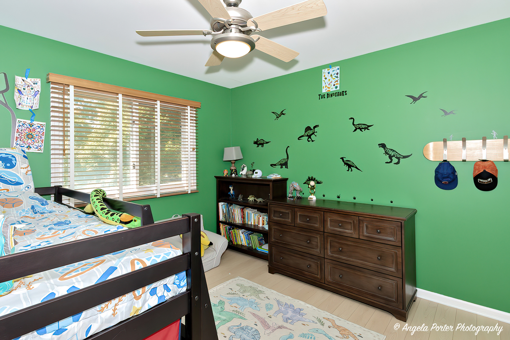 600 Raintree Road Buffalo Grove, IL 60089 - Photo 30 of 46 a bed room with a bed mirror and a window