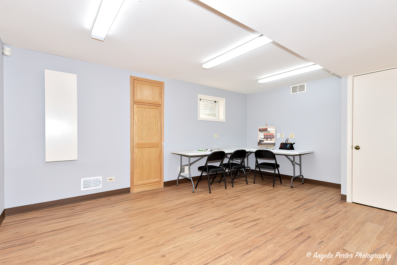 600 Raintree Road Buffalo Grove, IL 60089 - Photo 38 of 46 a living room with furniture and a wooden floor
