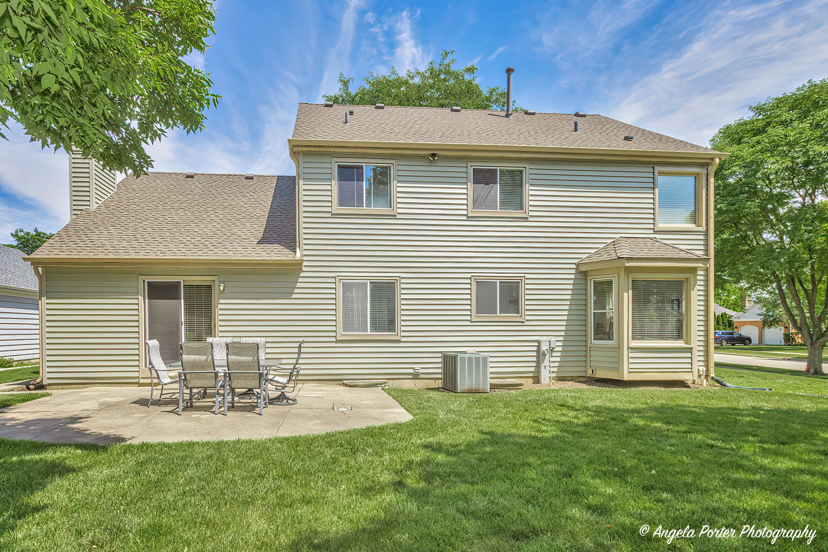 600 Raintree Road Buffalo Grove, IL 60089 - Photo 41 of 46 a view of a house with a yard and sitting area