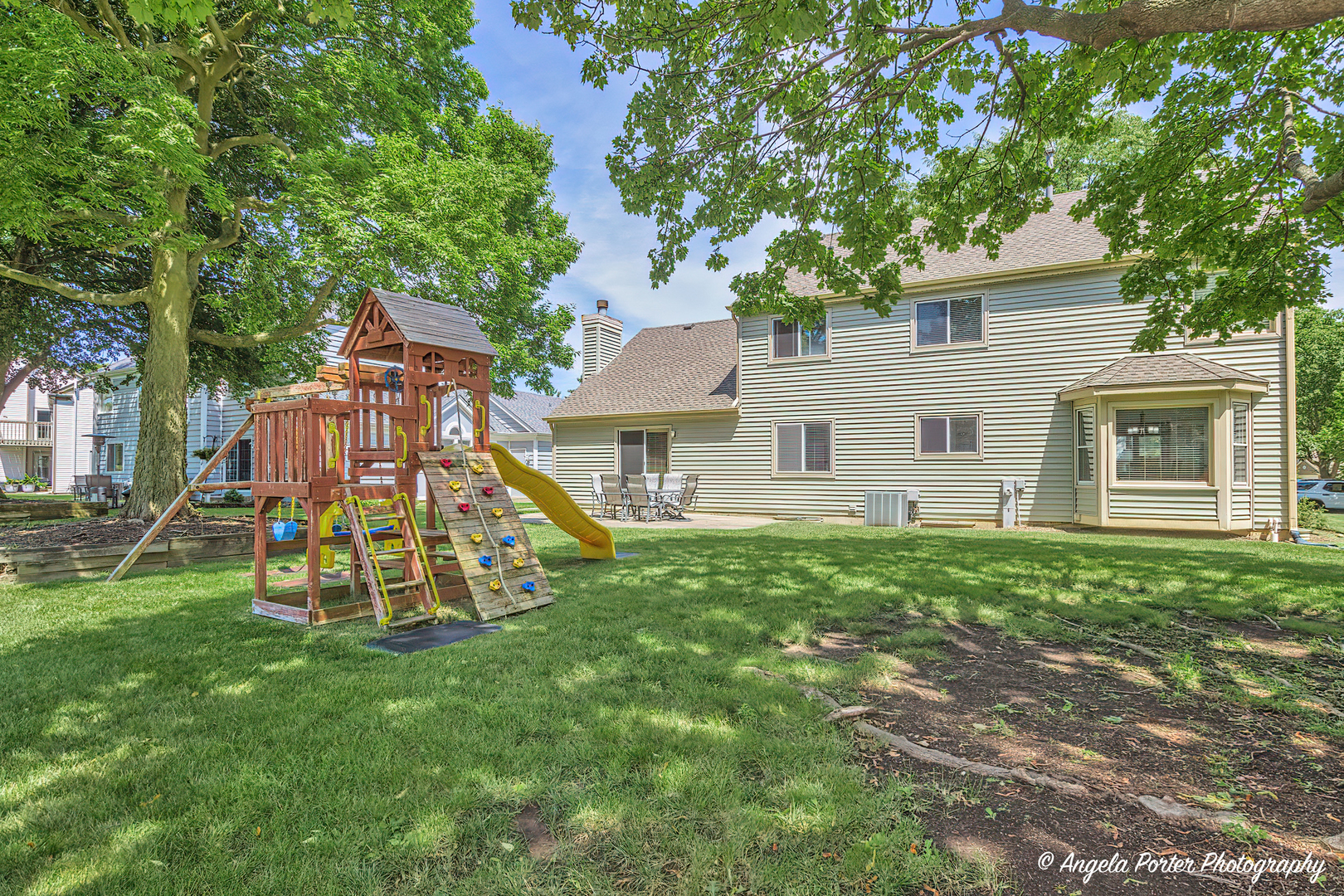 600 Raintree Road Buffalo Grove, IL 60089 - Photo 42 of 46 a view of a house with a backyard