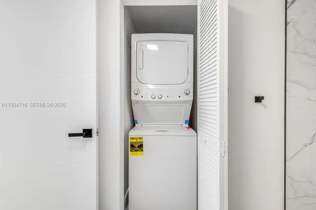 a bathroom with a sink toilet a shower and a mirror