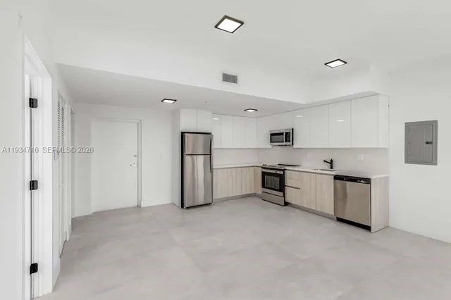 a view of a porch with wooden floor