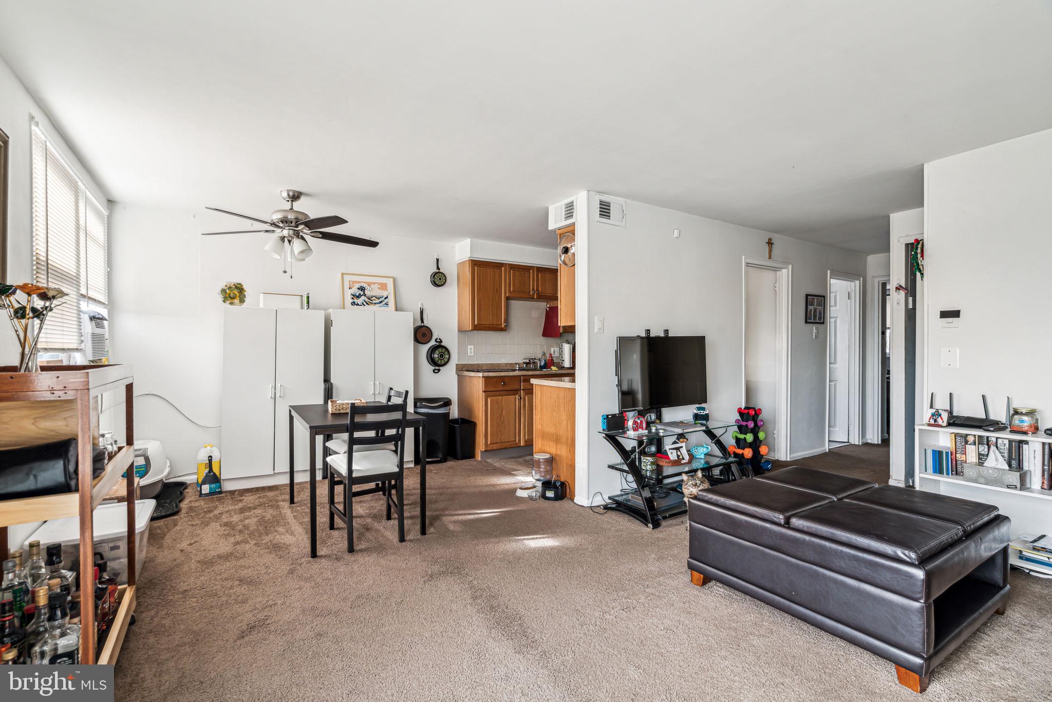 10203 East Keswick Road Philadelphia, PA 19114 - Photo 23 of 36 a living room with furniture and a flat screen tv