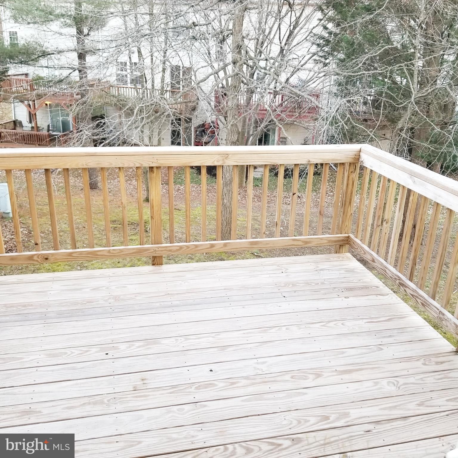 10401 Storch Drive Lanham, MD 20706 - Photo 23 of 28 a view of balcony with wooden floor