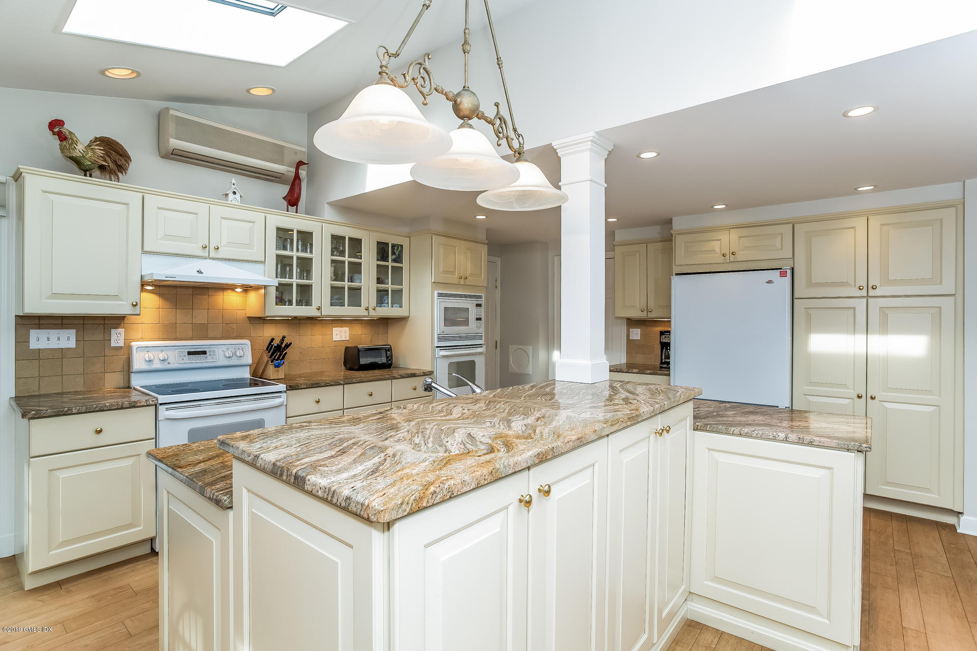 83 Winthrop Drive Riverside, CT 06878 - Photo 7 of 21 a kitchen with stainless steel appliances granite countertop a sink a oven and a refrigerator