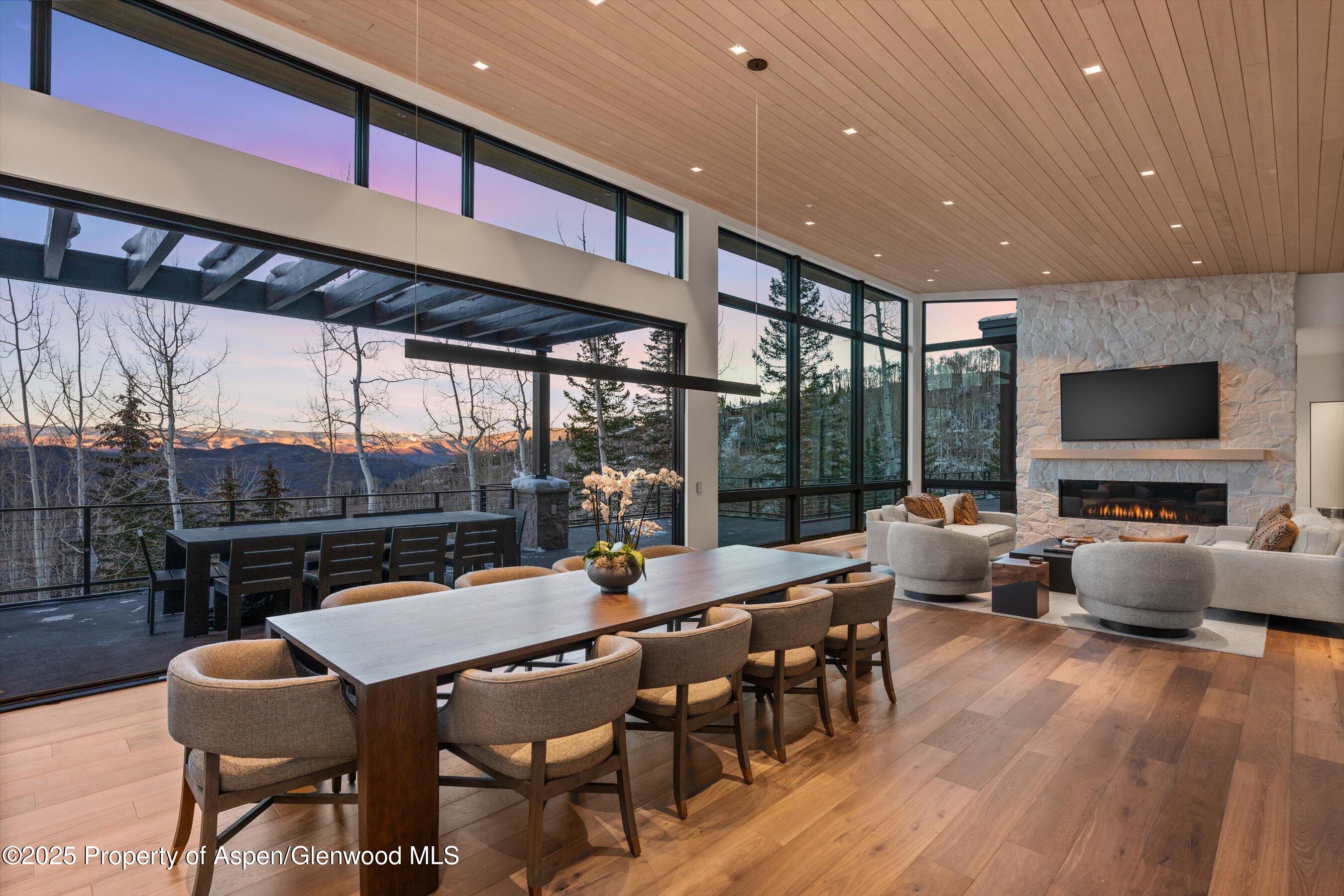 1234 Wood Road Snowmass Village, CO 81615 - Photo 58 of 66 a view of a big room with furniture window and wooden floor