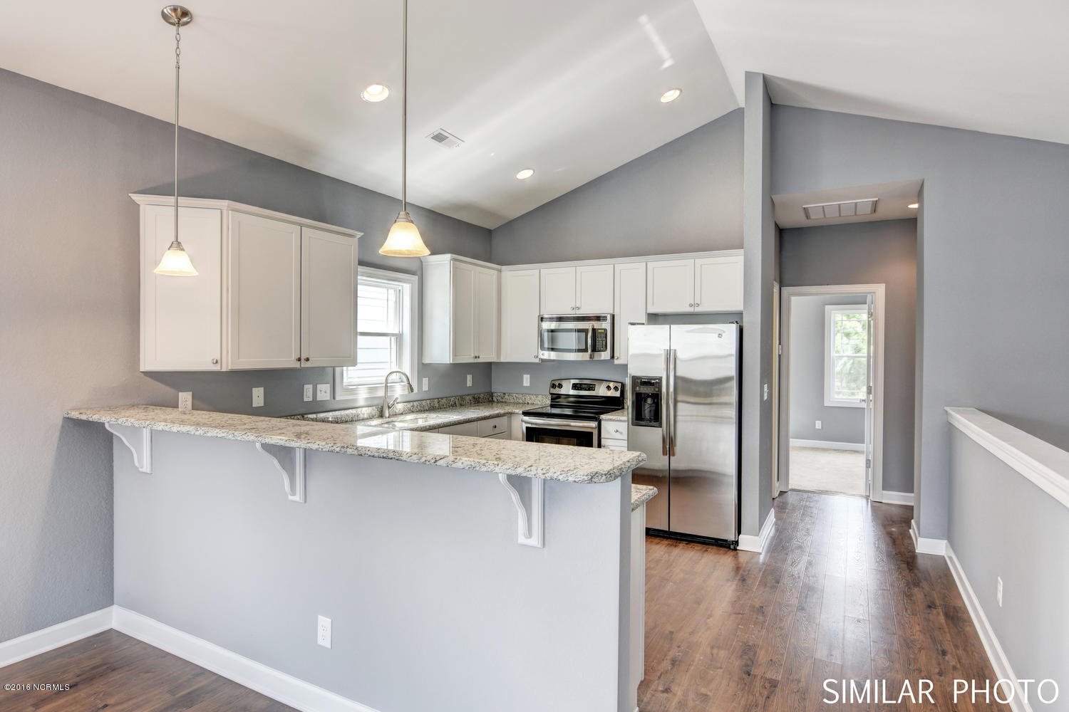 201 Dolphin & Shell Road, Unit A Surf City, NC 28445 - Photo 2 of 24 309 Vista Court Surf City NC-large-002-9