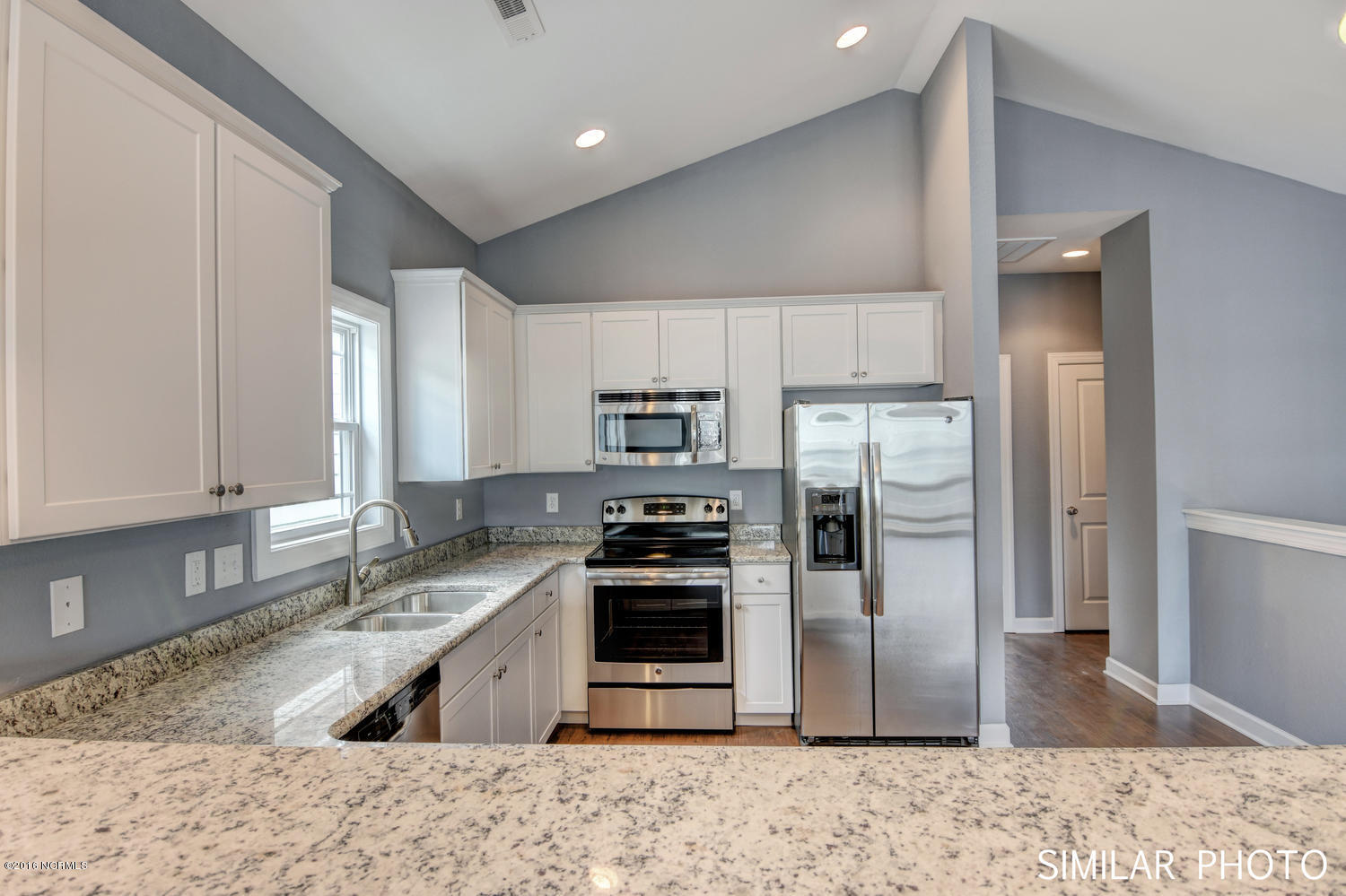 201 Dolphin & Shell Road, Unit A Surf City, NC 28445 - Photo 3 of 24 309 Vista Court Surf City NC-large-003-1