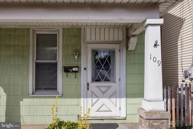 a view of front door and porch