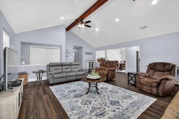 a living room with furniture and a couch