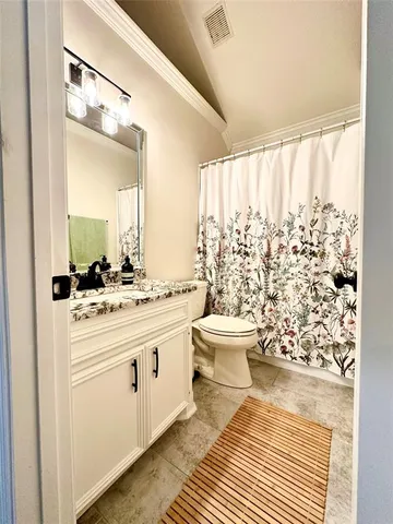 a very nice looking dining room with a table and chairs