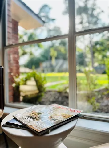 a bedroom with a bed and a chair