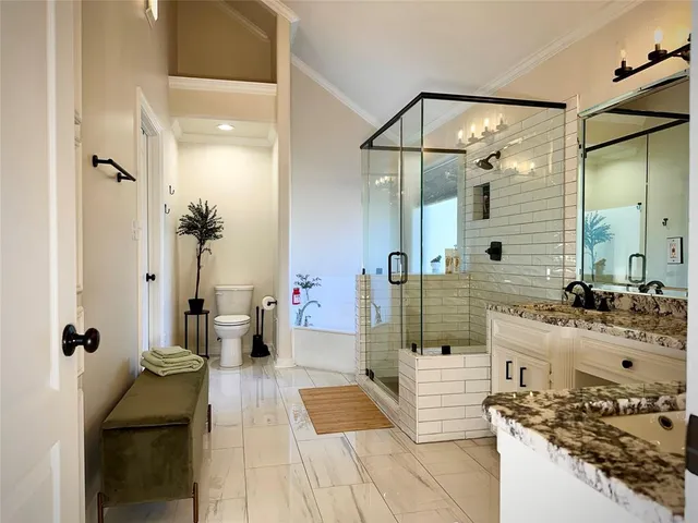 a bathroom with a double vanity sink and mirror