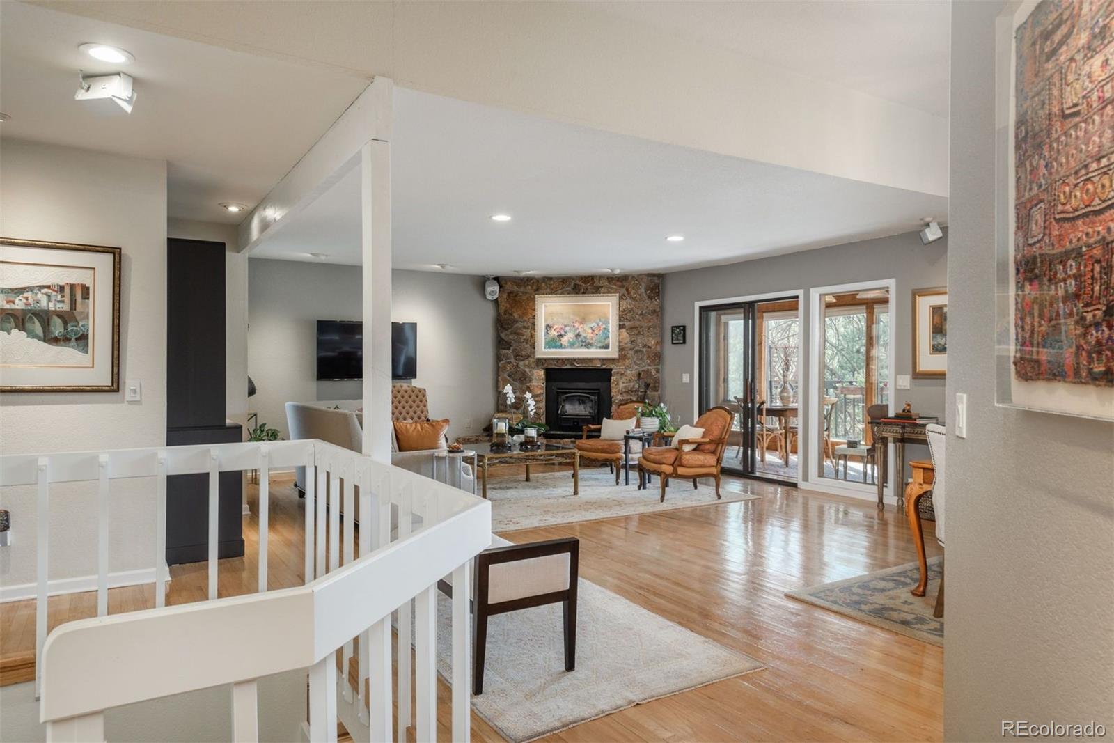 4192 Timbervale Drive Evergreen, CO 80439 - Photo 4 of 50 a view of a living room and dining room