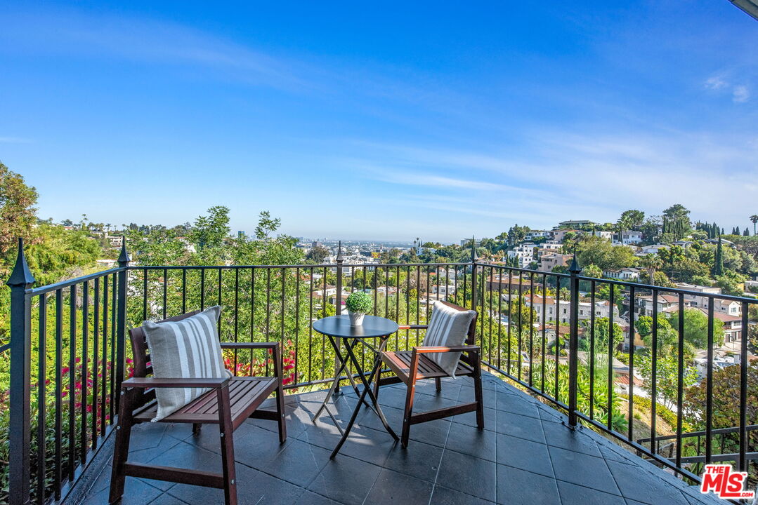 2175 Broadview Terrace Los Angeles, CA 90068 - Photo 1 of 1 a view of a chairs and table in the balcony