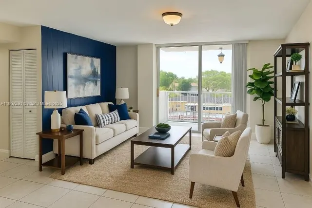 a living room with furniture and a large window