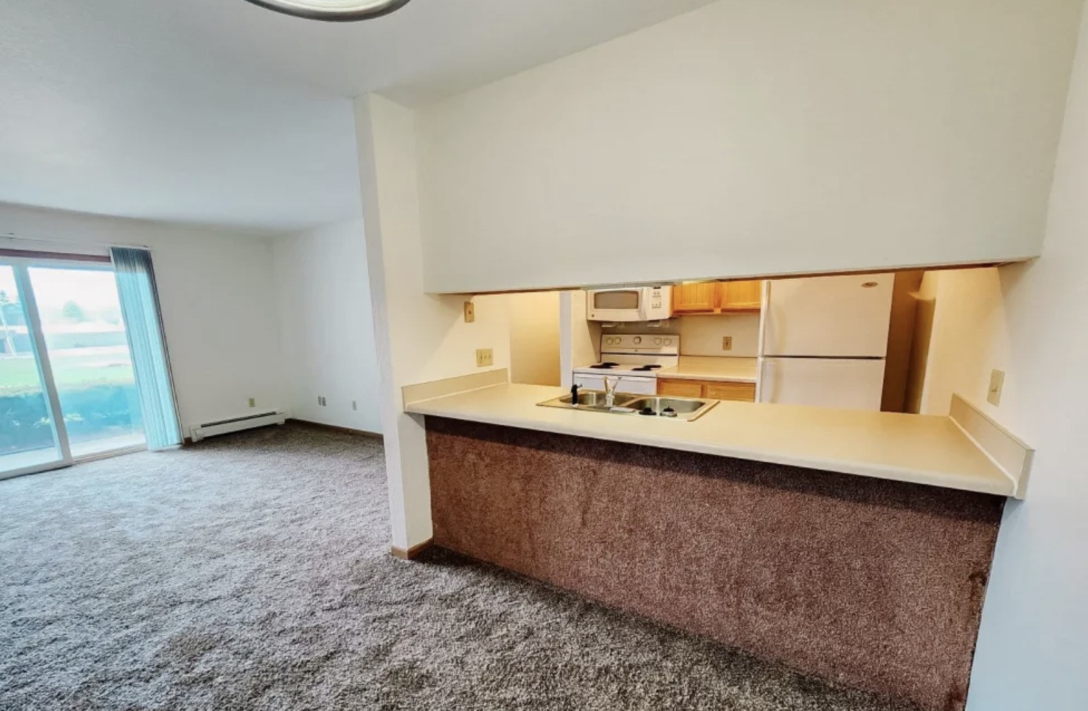 125 West Harrington Road Croswell, MI 48422 - Photo 4 of 11 an entryway with a window