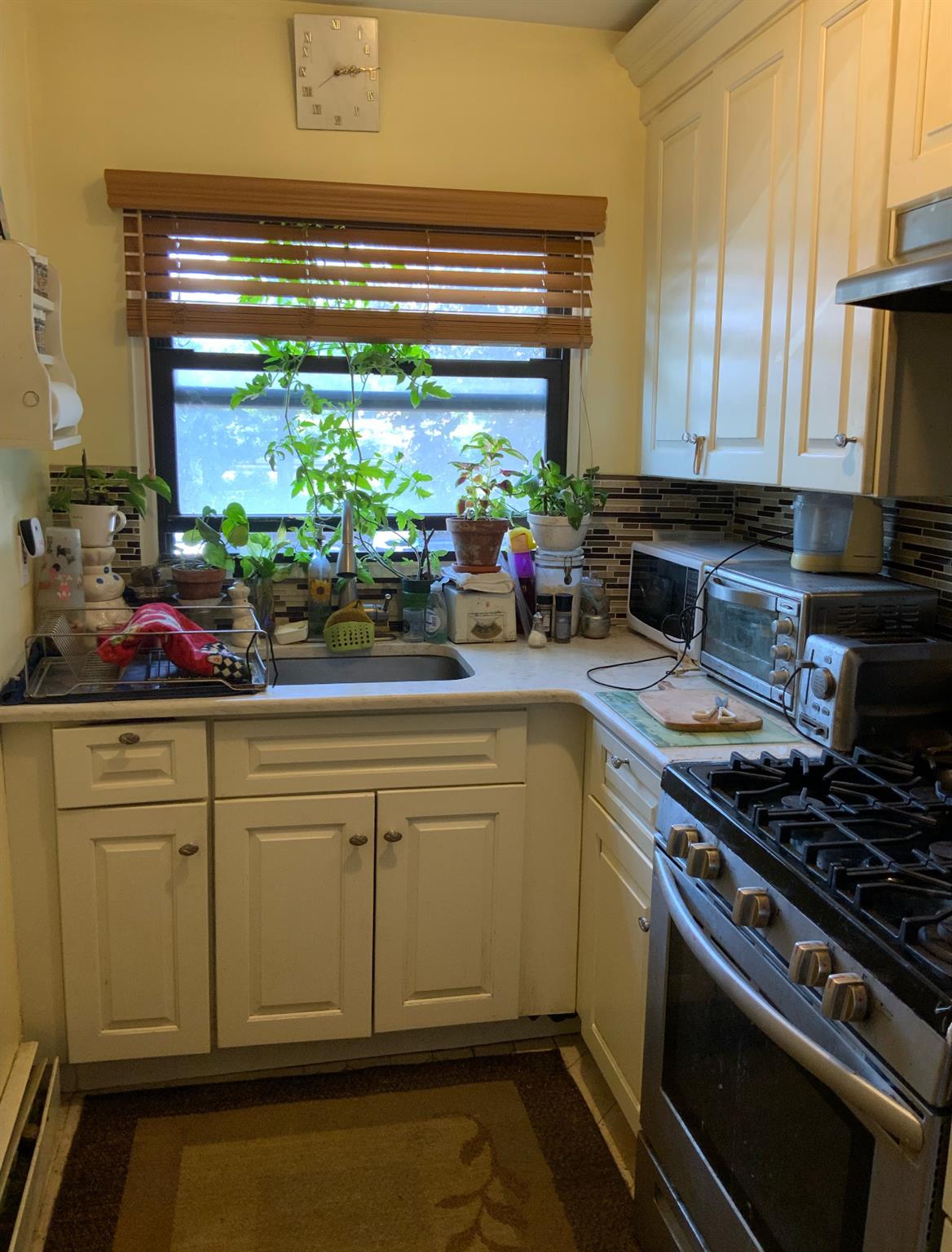 2261 Palmer Avenue, Unit 2A New Rochelle, NY 10801 - Photo 6 of 12 a kitchen with stove and cabinets