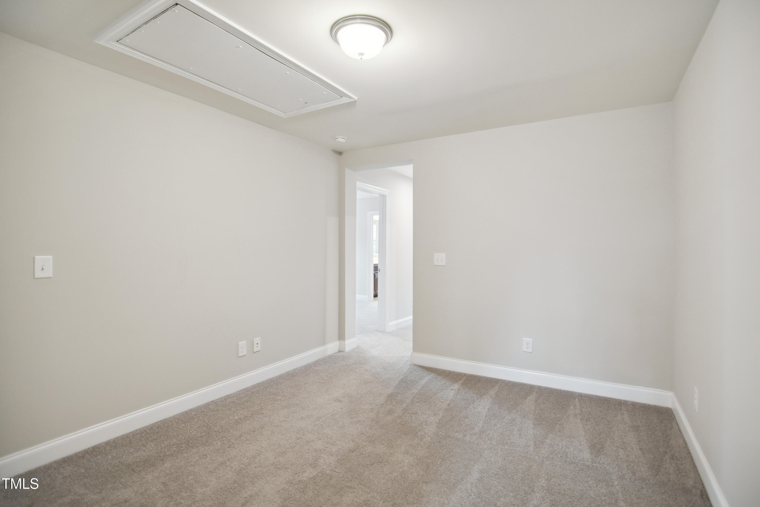 1015 Rexburg Drive Cary, NC 27513 - Photo 20 of 29 a view of an empty room