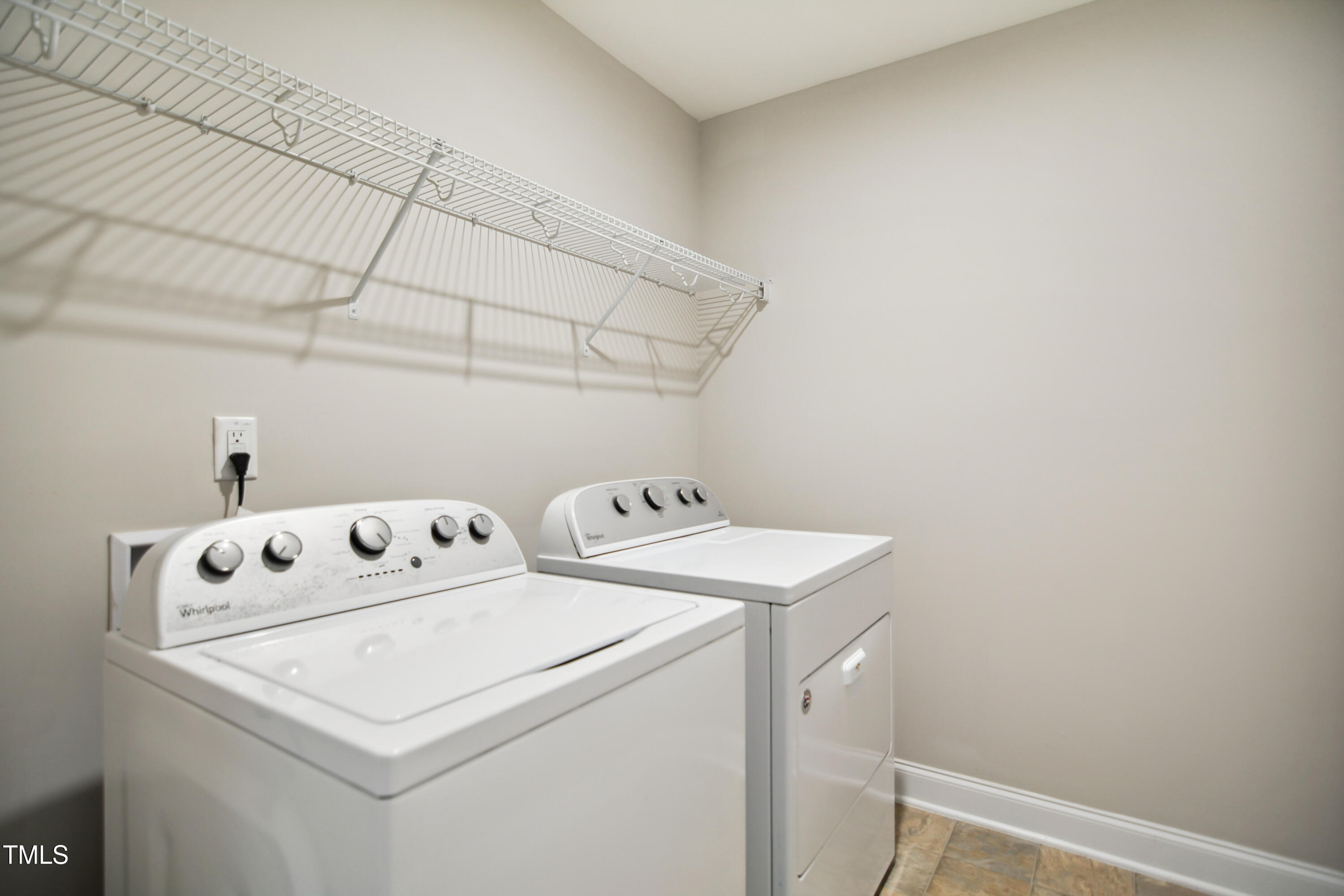 1015 Rexburg Drive Cary, NC 27513 - Photo 22 of 29 a utility room with dryer and washer