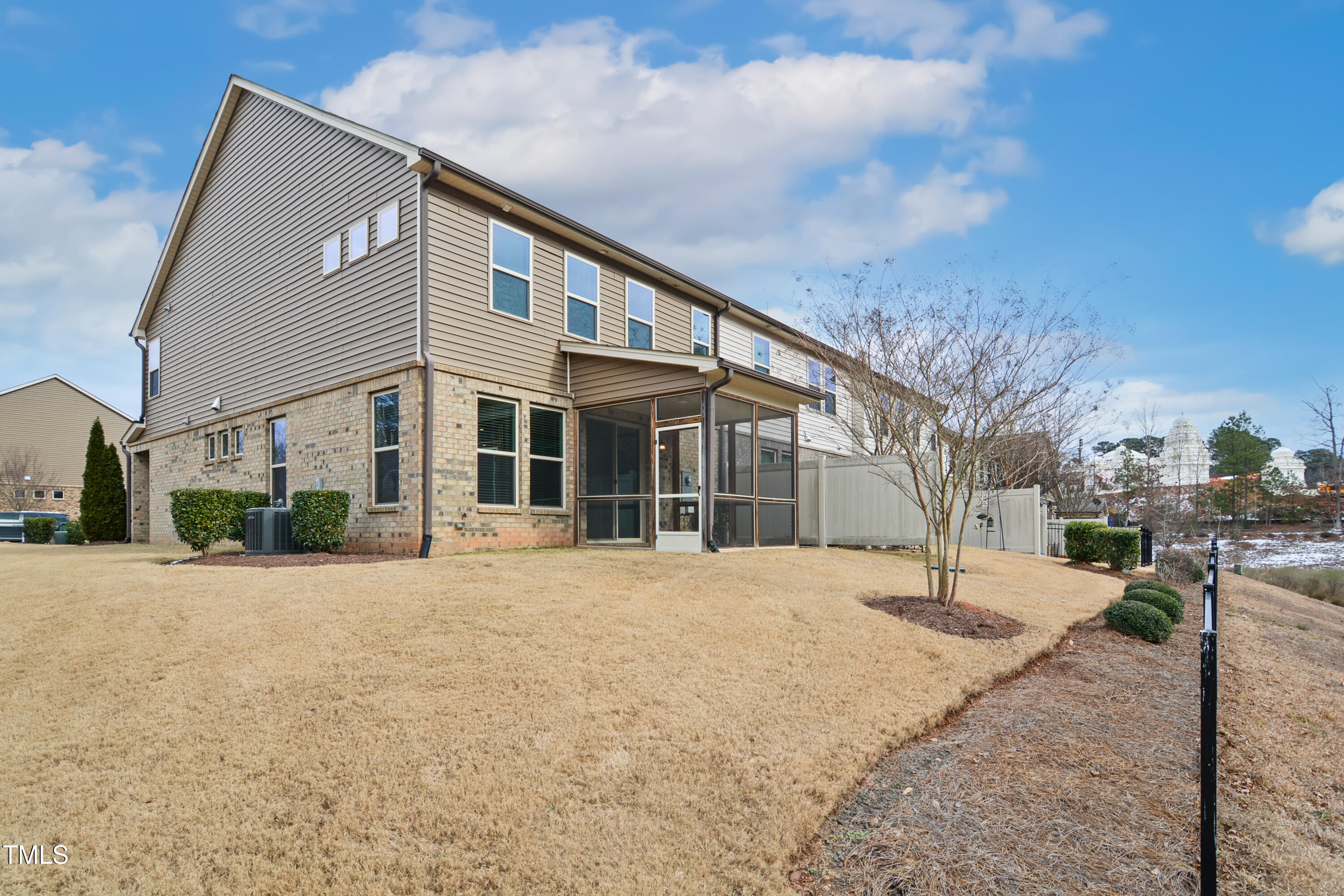 1015 Rexburg Drive Cary, NC 27513 - Photo 28 of 29 a front view of a house with a yard