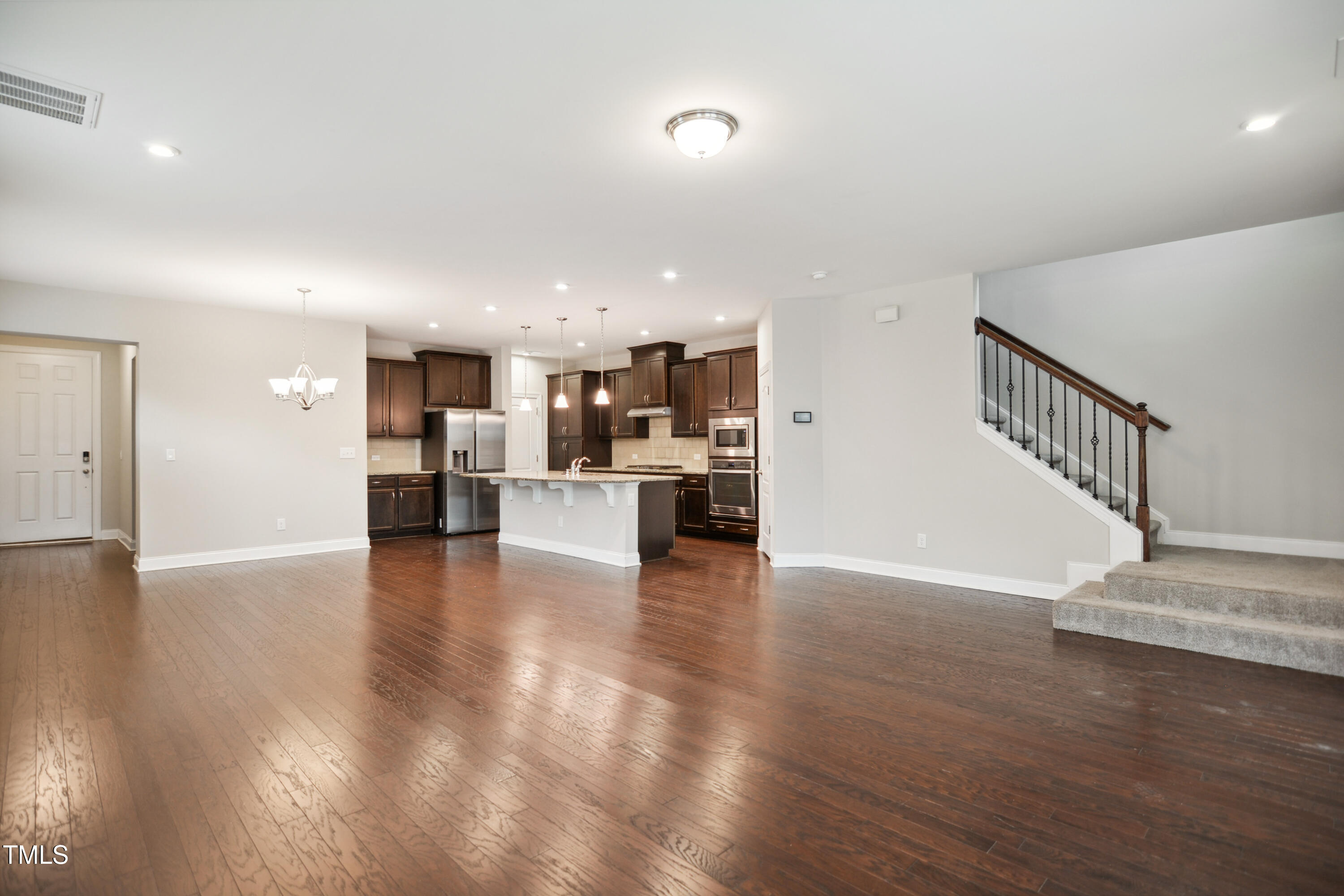 1015 Rexburg Drive Cary, NC 27513 - Photo 5 of 29 a view of kitchen view wooden floor and kitchen