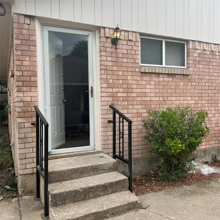 a front view of a house with a window