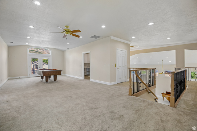 220 East Ridge Road Orem, UT 84057 - Photo 20 of 52 Arched double doors, recessed lighting, ceiling fan, and carpeted flooring