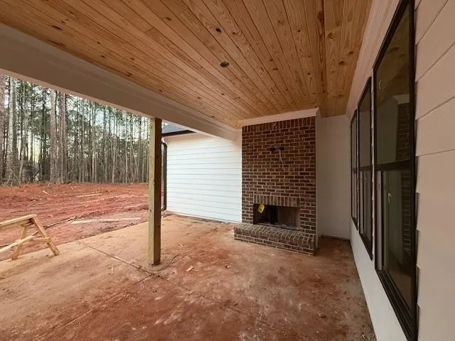 a view of backyard with a small cabin