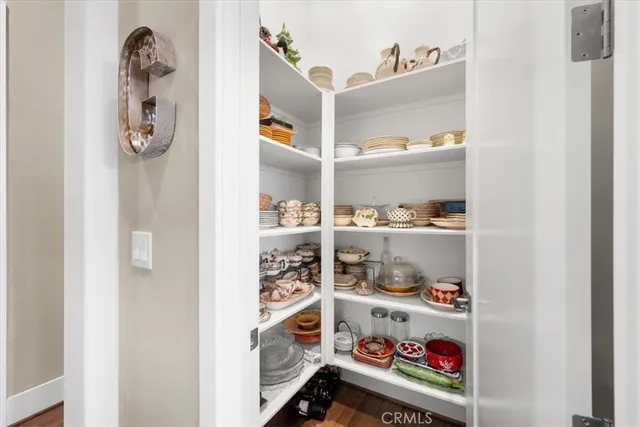 a spacious bedroom with a large bed and a window