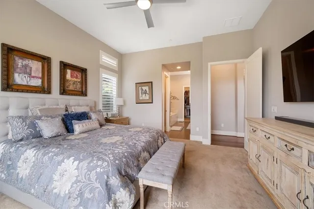 a large bathroom with a large tub sink and vanity