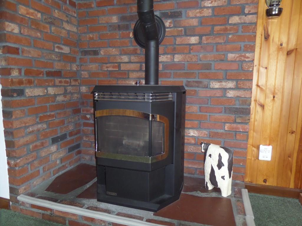 576 Main Road Eddington, ME 04428 - Photo 10 of 29 2010 pellet stove