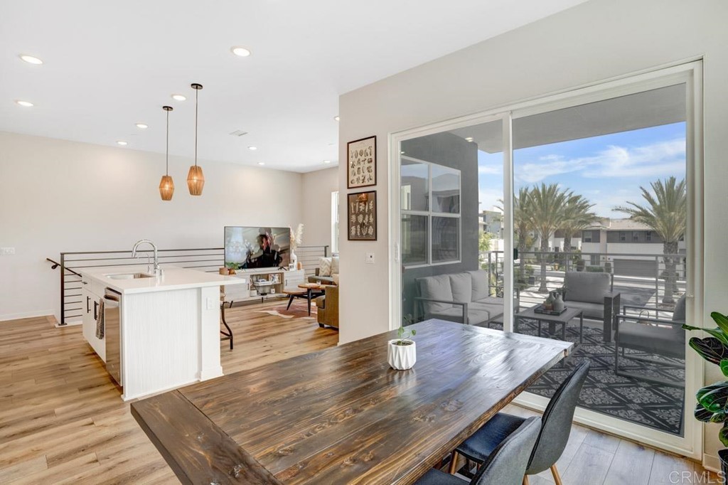 2048 Bravo Loop, Unit 2 Chula Vista, CA 91915 - Photo 11 of 34 a view of kitchen with cabinets and wooden floor