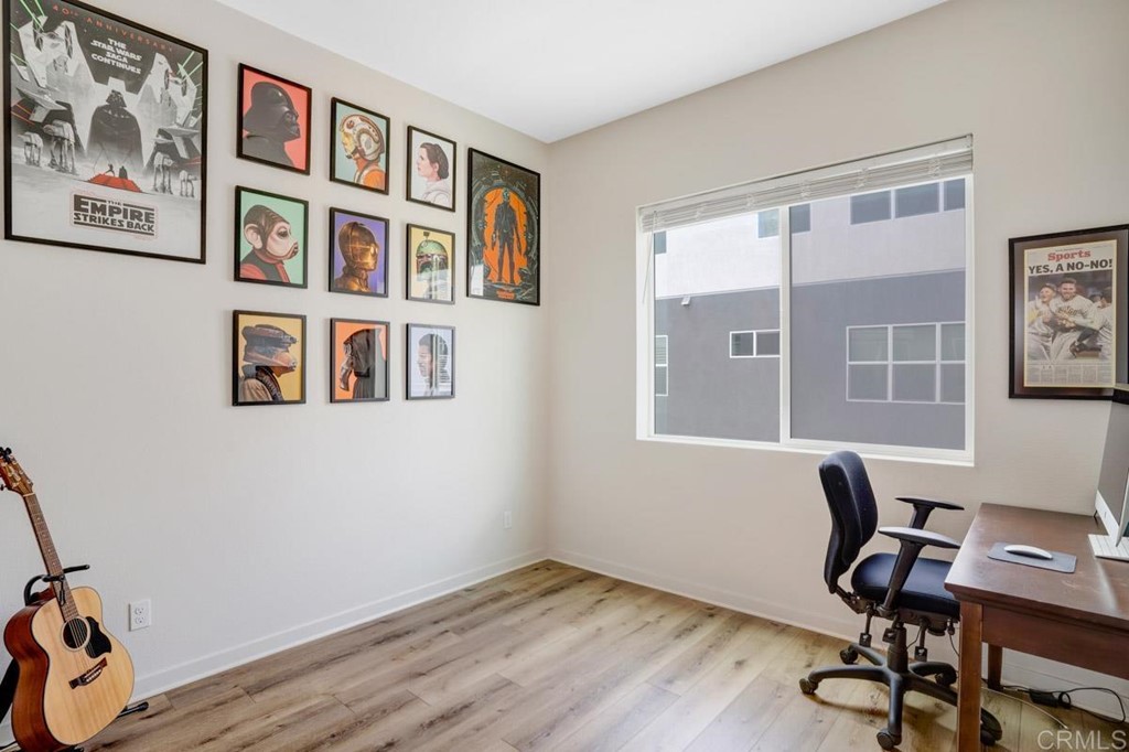 2048 Bravo Loop, Unit 2 Chula Vista, CA 91915 - Photo 19 of 34 a workspace with furniture and a window