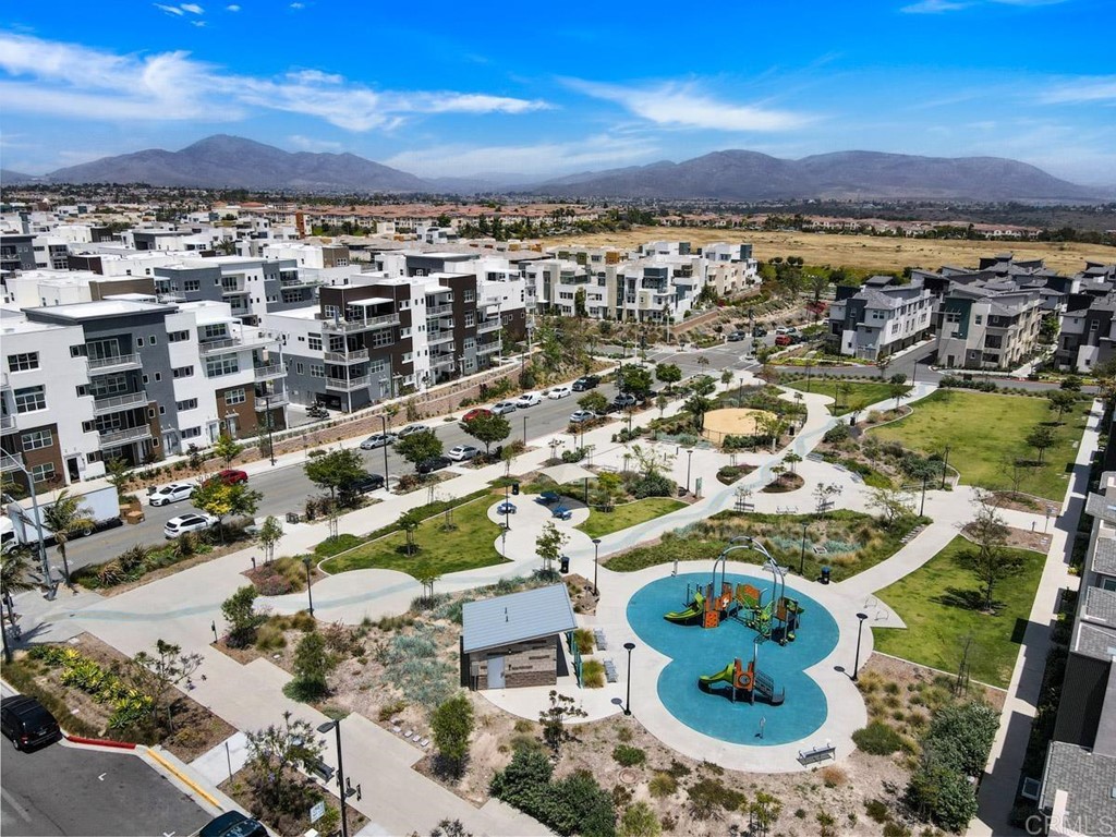 2048 Bravo Loop, Unit 2 Chula Vista, CA 91915 - Photo 33 of 34 an aerial view of residential houses with outdoor space