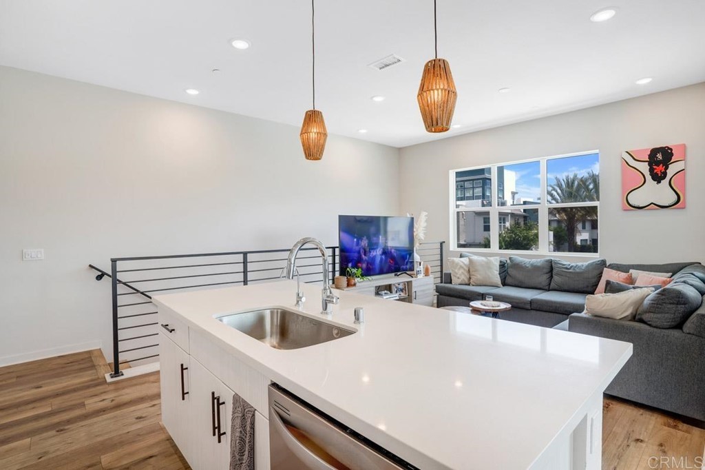 2048 Bravo Loop, Unit 2 Chula Vista, CA 91915 - Photo 7 of 34 a living room with furniture and a large window