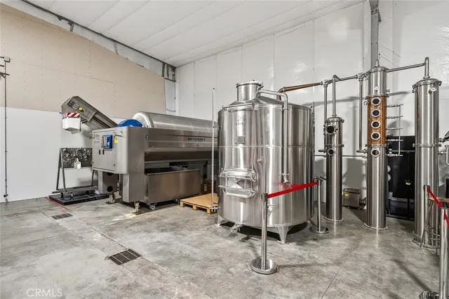 a living room filled with furniture and a window