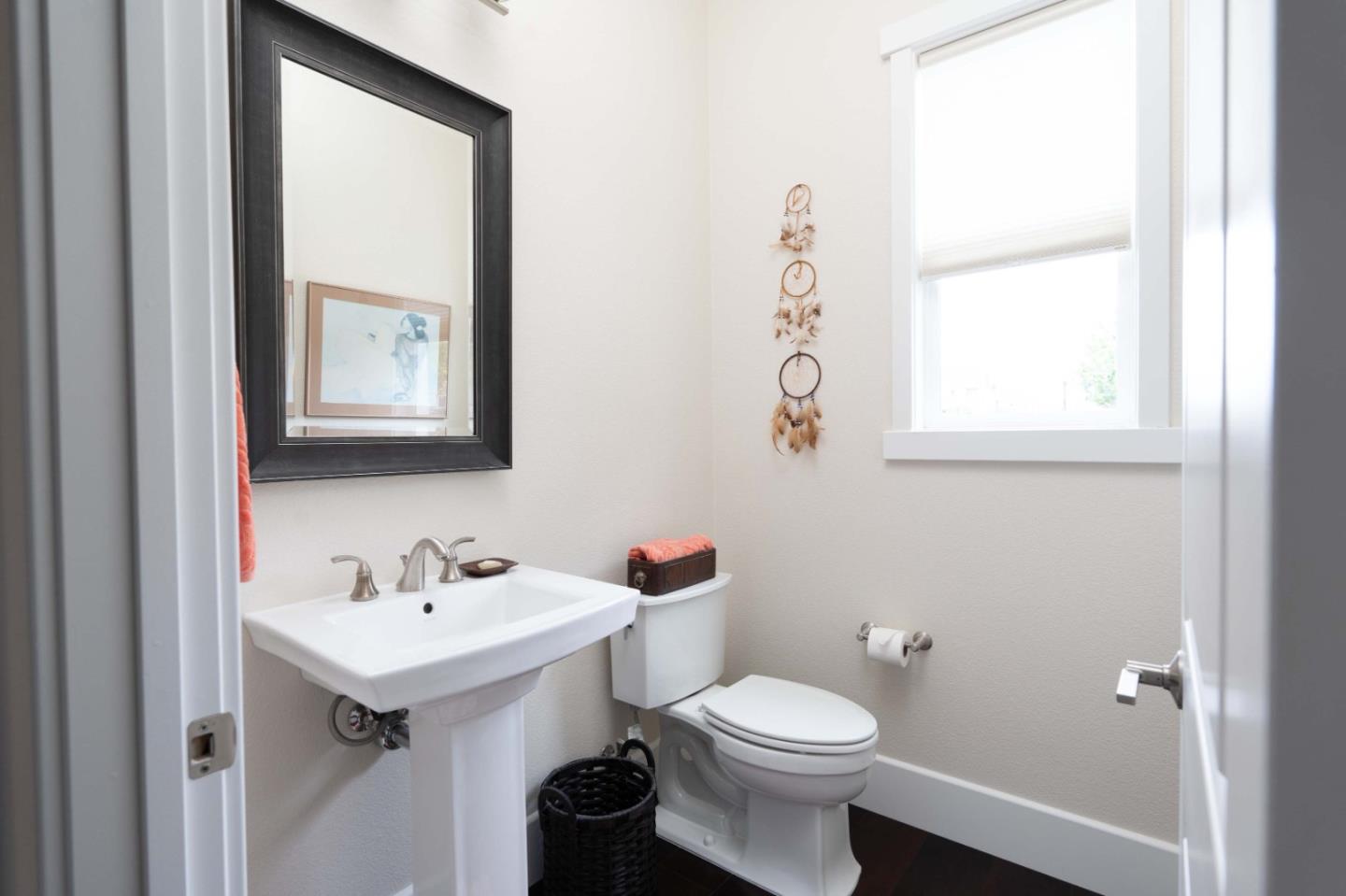 18527 McClellan Circle Marina, CA 93933 - Photo 14 of 35 a bathroom with a toilet sink and mirror