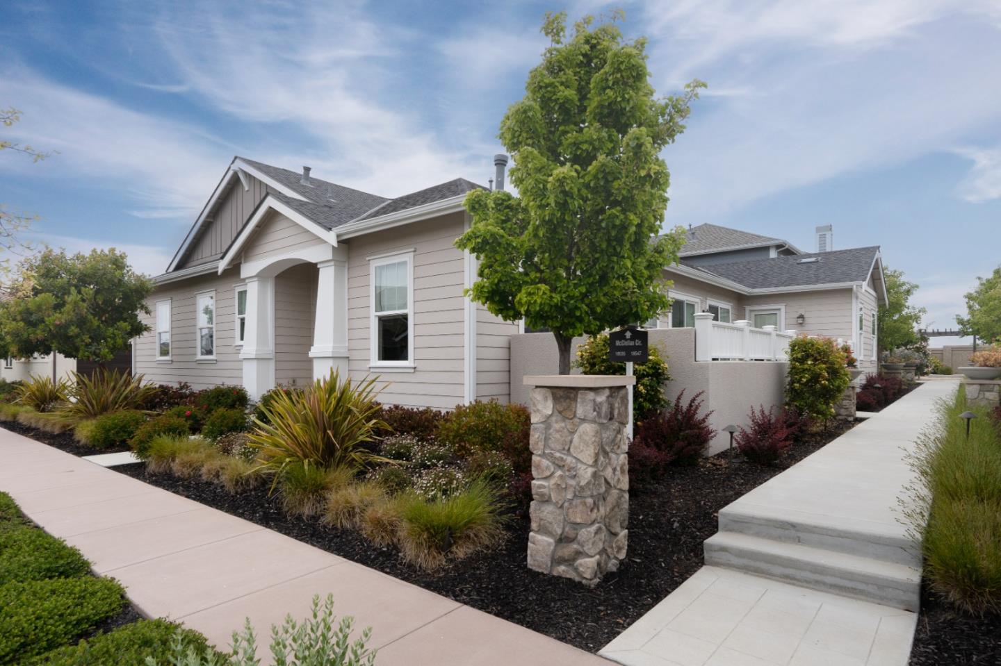 18527 McClellan Circle Marina, CA 93933 - Photo 2 of 35 a house that has a tree in front of it